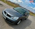 Сірий Міцубісі Lancer, об'ємом двигуна 1.58 л та пробігом 182 тис. км за 4500 $, фото 1 на Automoto.ua