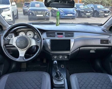 Серый Мицубиси Лансер, объемом двигателя 1.6 л и пробегом 203 тыс. км за 3500 $, фото 10 на Automoto.ua