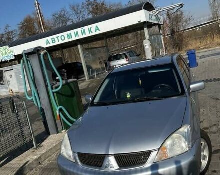 Сірий Міцубісі Lancer, об'ємом двигуна 1.6 л та пробігом 311 тис. км за 3800 $, фото 9 на Automoto.ua