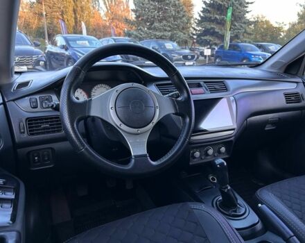 Серый Мицубиси Лансер, объемом двигателя 1.6 л и пробегом 203 тыс. км за 3500 $, фото 9 на Automoto.ua