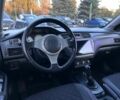 Серый Мицубиси Лансер, объемом двигателя 1.6 л и пробегом 203 тыс. км за 3500 $, фото 9 на Automoto.ua