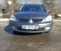 Сірий Міцубісі Lancer, об'ємом двигуна 1.58 л та пробігом 246 тис. км за 4100 $, фото 3 на Automoto.ua