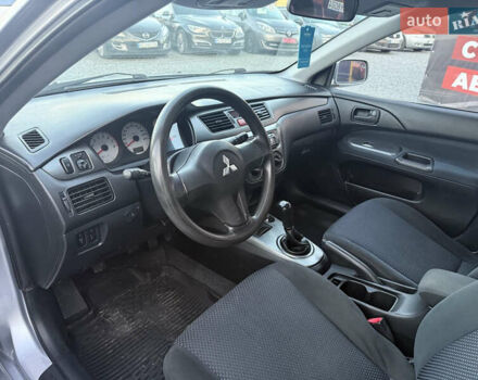 Серый Мицубиси Лансер, объемом двигателя 1.6 л и пробегом 278 тыс. км за 3900 $, фото 11 на Automoto.ua