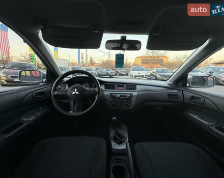 Серый Мицубиси Лансер, объемом двигателя 1.6 л и пробегом 278 тыс. км за 3900 $, фото 5 на Automoto.ua