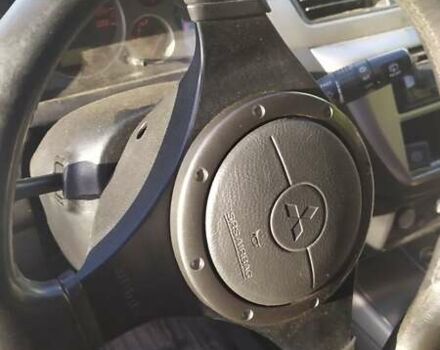 Сірий Міцубісі Lancer, об'ємом двигуна 1.6 л та пробігом 200 тис. км за 4700 $, фото 2 на Automoto.ua