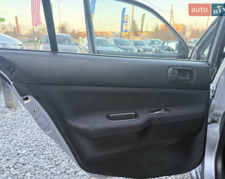 Серый Мицубиси Лансер, объемом двигателя 1.6 л и пробегом 278 тыс. км за 3900 $, фото 9 на Automoto.ua