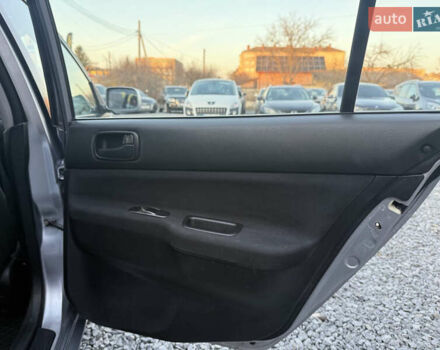 Серый Мицубиси Лансер, объемом двигателя 1.6 л и пробегом 278 тыс. км за 3900 $, фото 12 на Automoto.ua