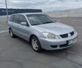 Сірий Міцубісі Lancer, об'ємом двигуна 1.58 л та пробігом 240 тис. км за 5000 $, фото 1 на Automoto.ua