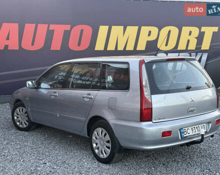Серый Мицубиси Лансер, объемом двигателя 1.6 л и пробегом 278 тыс. км за 3900 $, фото 3 на Automoto.ua