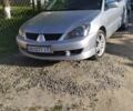 Сірий Міцубісі Lancer, об'ємом двигуна 1.6 л та пробігом 200 тис. км за 4700 $, фото 8 на Automoto.ua