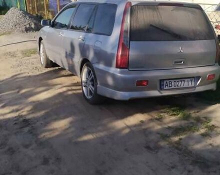 Сірий Міцубісі Lancer, об'ємом двигуна 1.6 л та пробігом 200 тис. км за 4700 $, фото 9 на Automoto.ua