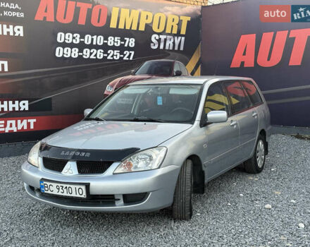 Серый Мицубиси Лансер, объемом двигателя 1.6 л и пробегом 278 тыс. км за 3900 $, фото 1 на Automoto.ua