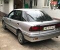 Серый Мицубиси Лансер, объемом двигателя 1.5 л и пробегом 292 тыс. км за 2000 $, фото 1 на Automoto.ua