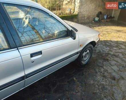 Серый Мицубиси Лансер, объемом двигателя 1.8 л и пробегом 180 тыс. км за 4500 $, фото 1 на Automoto.ua