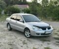 Сірий Міцубісі Lancer, об'ємом двигуна 1.6 л та пробігом 196 тис. км за 4100 $, фото 1 на Automoto.ua