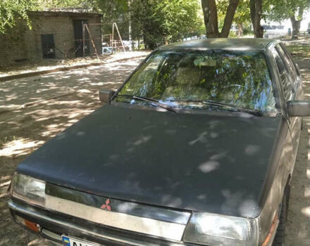 Сірий Міцубісі Lancer, об'ємом двигуна 1.47 л та пробігом 300 тис. км за 602 $, фото 1 на Automoto.ua