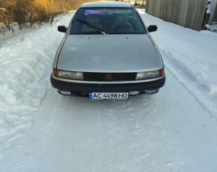 Серый Мицубиси Лансер, объемом двигателя 1.5 л и пробегом 80 тыс. км за 900 $, фото 1 на Automoto.ua