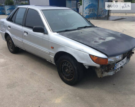 Сірий Міцубісі Lancer, об'ємом двигуна 1.6 л та пробігом 170 тис. км за 1000 $, фото 1 на Automoto.ua