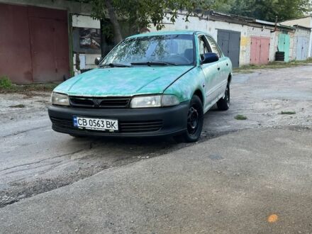 Серый Мицубиси Лансер, объемом двигателя 1.3 л и пробегом 3 тыс. км за 700 $, фото 1 на Automoto.ua