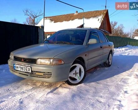 Серый Мицубиси Лансер, объемом двигателя 1.59 л и пробегом 450 тыс. км за 1400 $, фото 1 на Automoto.ua