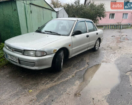 Сірий Міцубісі Lancer, об'ємом двигуна 1.3 л та пробігом 218 тис. км за 1000 $, фото 1 на Automoto.ua