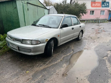 Сірий Міцубісі Lancer, об'ємом двигуна 1.3 л та пробігом 211 тис. км за 1000 $, фото 1 на Automoto.ua