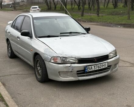 Сірий Міцубісі Lancer, об'ємом двигуна 1.3 л та пробігом 200 тис. км за 1100 $, фото 1 на Automoto.ua
