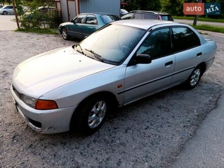 Сірий Міцубісі Lancer, об'ємом двигуна 1.3 л та пробігом 371 тис. км за 1100 $, фото 1 на Automoto.ua