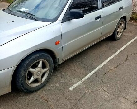 Серый Мицубиси Лансер, объемом двигателя 1.3 л и пробегом 360 тыс. км за 1750 $, фото 1 на Automoto.ua