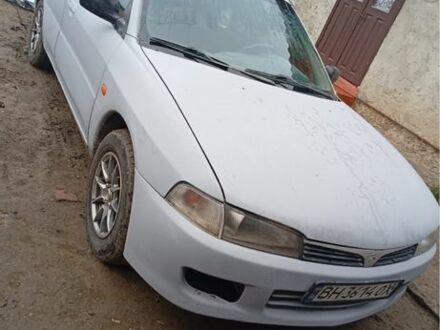 Сірий Міцубісі Lancer, об'ємом двигуна 1.3 л та пробігом 260 тис. км за 1700 $, фото 1 на Automoto.ua