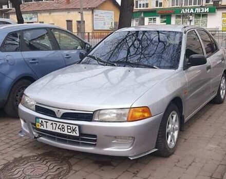 Сірий Міцубісі Lancer, об'ємом двигуна 1.3 л та пробігом 430 тис. км за 2000 $, фото 1 на Automoto.ua