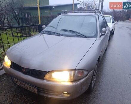 Серый Мицубиси Лансер, объемом двигателя 1.46 л и пробегом 222 тыс. км за 1399 $, фото 1 на Automoto.ua