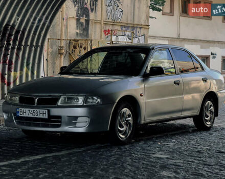 Сірий Міцубісі Lancer, об'ємом двигуна 1.3 л та пробігом 300 тис. км за 1800 $, фото 1 на Automoto.ua