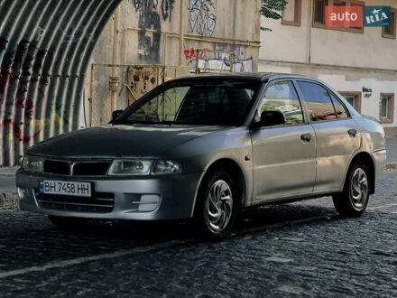 Сірий Міцубісі Lancer, об'ємом двигуна 1.3 л та пробігом 300 тис. км за 1800 $, фото 1 на Automoto.ua