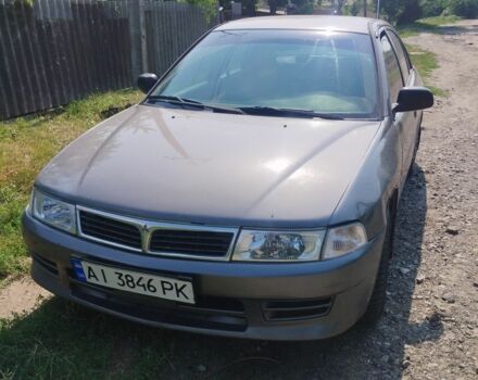 Сірий Міцубісі Lancer, об'ємом двигуна 1.3 л та пробігом 281 тис. км за 1851 $, фото 1 на Automoto.ua