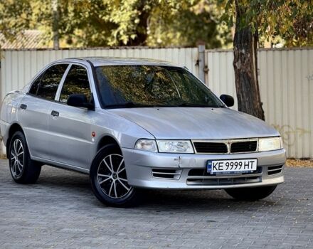 Сірий Міцубісі Lancer, об'ємом двигуна 1.3 л та пробігом 155 тис. км за 1450 $, фото 1 на Automoto.ua