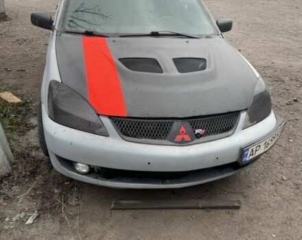 Серый Мицубиси Лансер, объемом двигателя 2 л и пробегом 250 тыс. км за 1500 $, фото 1 на Automoto.ua