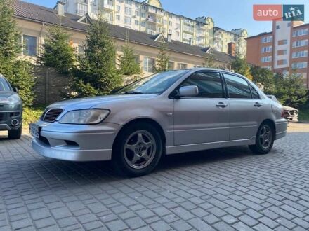 Мицубиси Лансер 2002 в Ивано-Франковске на Automoto.ua Серый Мицубиси Лансер, объемом двигателя 2 л и пробегом 184 тыс. км за 3999 $, фото 1 на Automoto.ua