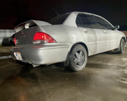 Сірий Міцубісі Lancer, об'ємом двигуна 2 л та пробігом 3 тис. км за 3850 $, фото 1 на Automoto.ua