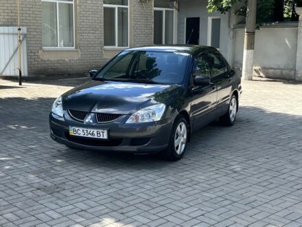 Сірий Міцубісі Lancer, об'ємом двигуна 1.6 л та пробігом 295 тис. км за 4150 $, фото 1 на Automoto.ua