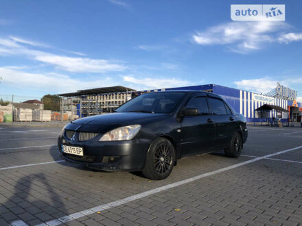 Сірий Міцубісі Lancer, об'ємом двигуна 1.58 л та пробігом 232 тис. км за 2899 $, фото 1 на Automoto.ua