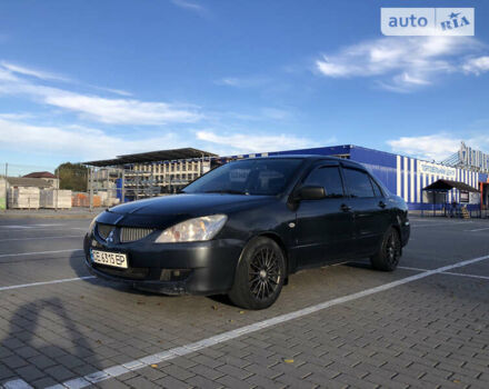 Сірий Міцубісі Lancer, об'ємом двигуна 1.58 л та пробігом 232 тис. км за 2899 $, фото 1 на Automoto.ua