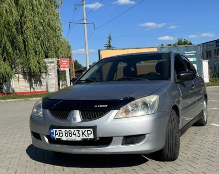 Серый Мицубиси Лансер, объемом двигателя 1.6 л и пробегом 280 тыс. км за 2650 $, фото 1 на Automoto.ua