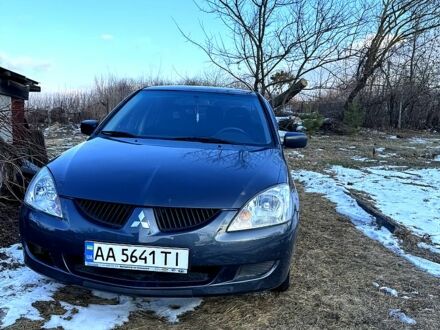Мицубиси Лансер 2003 в Василькове на Automoto.ua Серый Мицубиси Лансер, объемом двигателя 1.6 л и пробегом 380 тыс. км за 3600 $, фото 1 на Automoto.ua