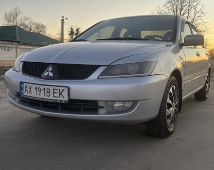 Серый Мицубиси Лансер, объемом двигателя 1.6 л и пробегом 330 тыс. км за 4500 $, фото 1 на Automoto.ua