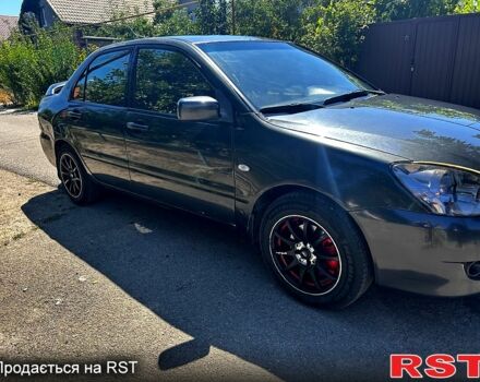 Сірий Міцубісі Lancer, об'ємом двигуна 1.6 л та пробігом 250 тис. км за 3900 $, фото 1 на Automoto.ua
