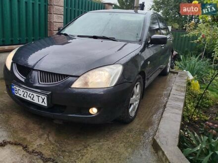 Мицубиси Лансер 2003 в Золочев на Automoto.ua Серый Мицубиси Лансер, объемом двигателя 1.6 л и пробегом 260 тыс. км за 2799 $, фото 1 на Automoto.ua