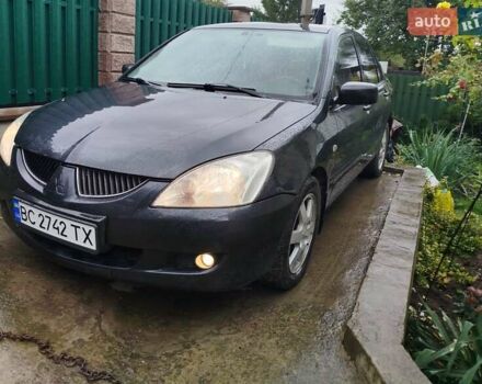 Сірий Міцубісі Lancer, об'ємом двигуна 1.6 л та пробігом 260 тис. км за 2799 $, фото 1 на Automoto.ua