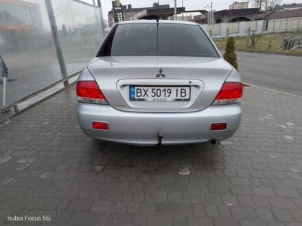 Мицубиси Лансер 2003 в Староконстантинов на Automoto.ua Серый Мицубиси Лансер, объемом двигателя 1.6 л и пробегом 294 тыс. км за 3300 $, фото 1 на Automoto.ua