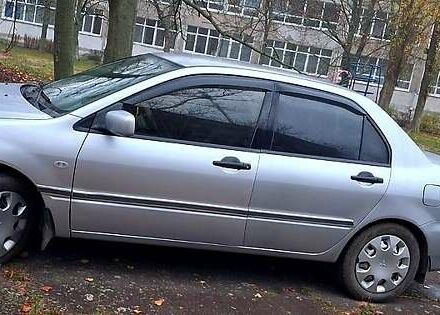 Серый Мицубиси Лансер, объемом двигателя 1.6 л и пробегом 213 тыс. км за 4400 $, фото 1 на Automoto.ua